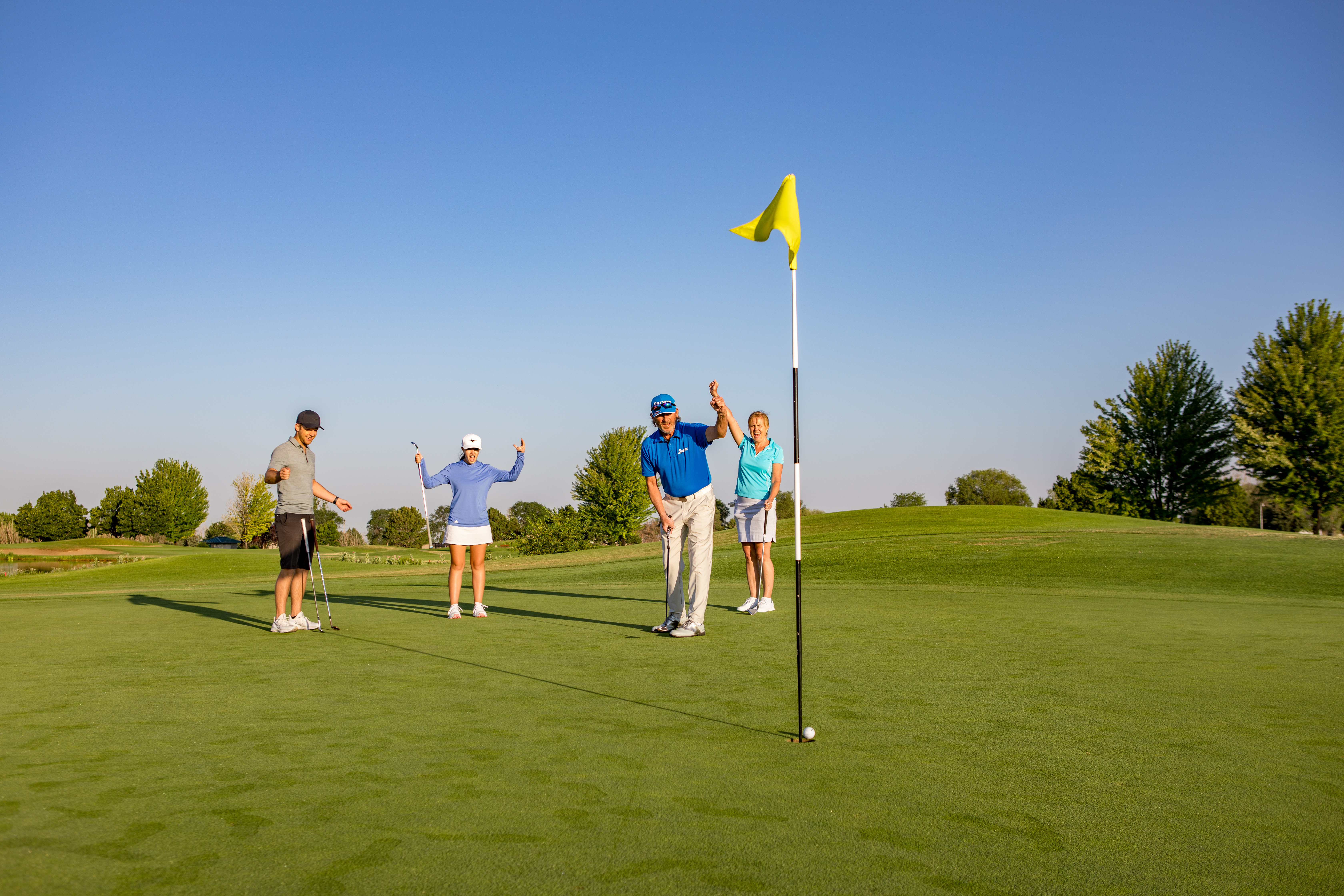 A family playing golf in Nampa, Idaho.